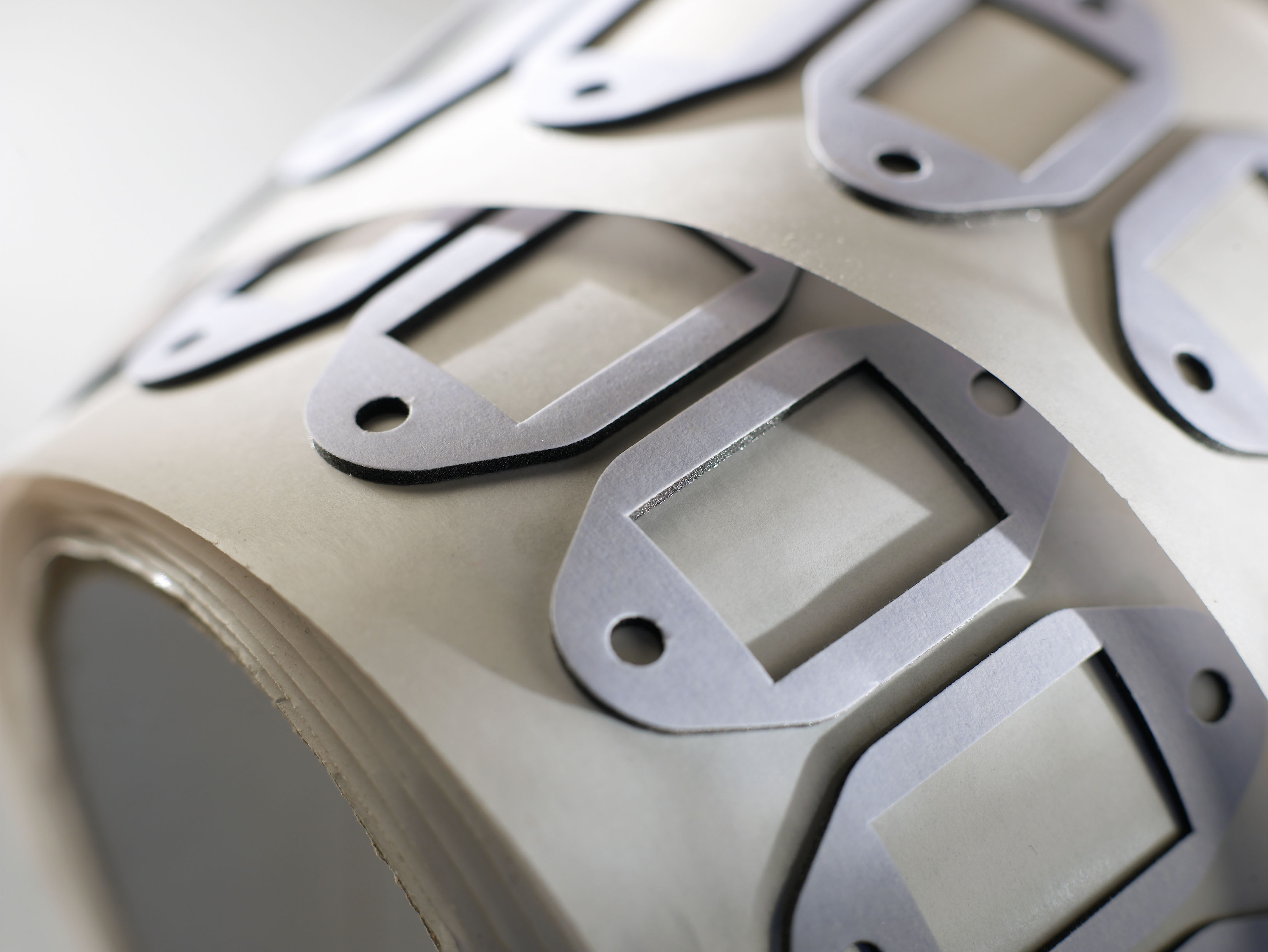 Die-cut adhesive part tips