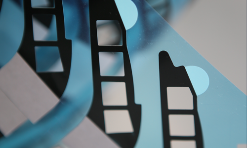 Adhesive gasket light blocking adhesive detail