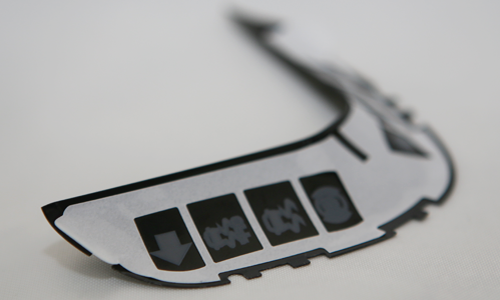 Adhesive gasket applied to instrument cluster part